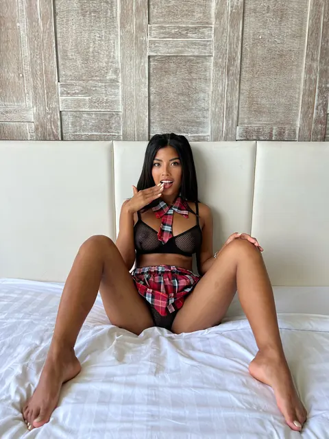 Tita Sahara: Brunette Asian Babe Strips Off Her Uniform Skirt in the Bedroom – photo 10 of 20