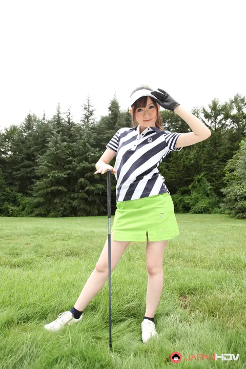 Japanese Brunette Flashes Panties Under Skirt on Golf Links – photo 6 of 15