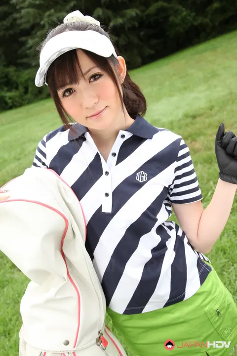 Japanese Brunette Flashes Panties Under Skirt on Golf Links – photo 2 of 15