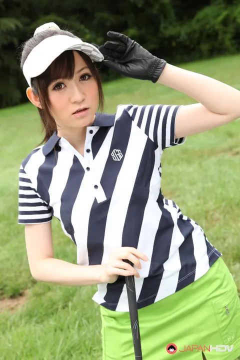 Japanese Brunette Flashes Panties Under Skirt on Golf Links – photo 5 of 15