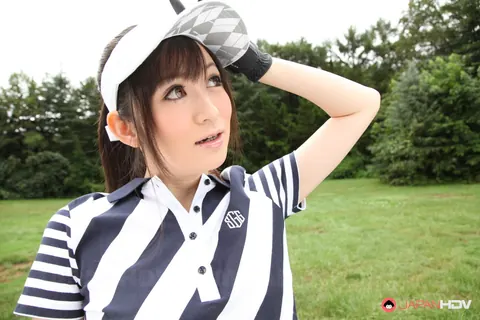 Japanese Brunette Flashes Panties Under Skirt on Golf Links – photo 3 of 15