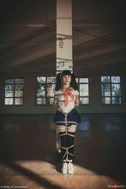Japanese Woman in Uniform Skirt and Socks Tied Upside Down – photo 4 of 16