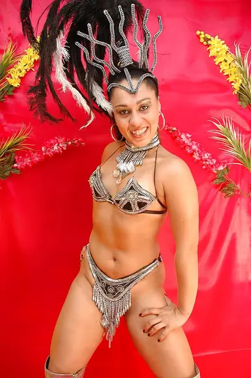 Thick Latina Strips Out of Her Carnival Costume and Lingerie