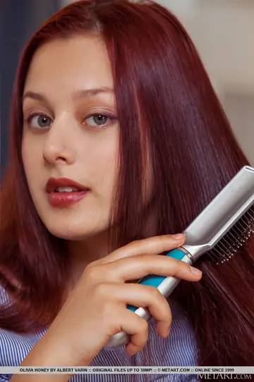 Olivia Honey – Redhead Brushes Her Long Hair Then Strips Out of Her Skirt