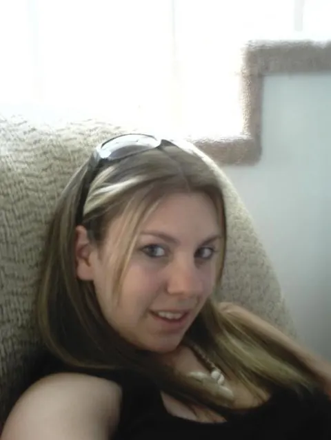 Woman with Big Tits Flaunts Cleavage in a Bikini and Glasses – photo 1 of 9