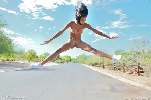 Nia Nacci: Slim Ebony Brunette with Big Natural Tits Exercises and Jogs Nude in Public – photo 15 of 15