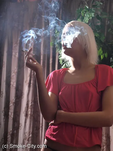 European Blonde Smokes in a Blouse and Panties – photo 6 of 16