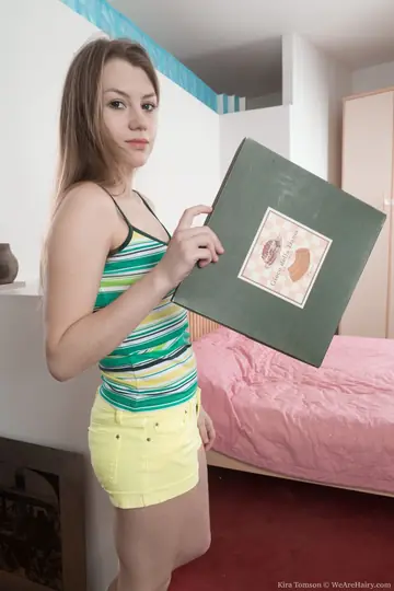 Brunette Strips Naked to Show Her Hairy Bush and Spreads Her Pussy