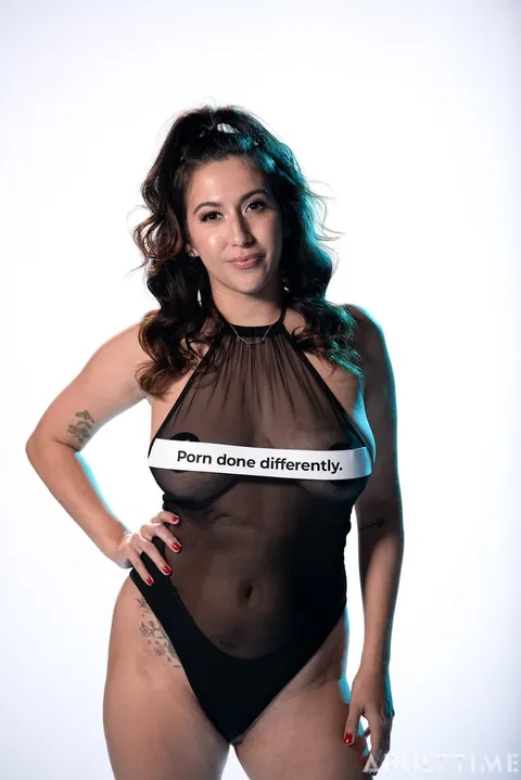 April ONeil: Busty Latina Strips Out of Her Sheer Bodysuit in Heels – photo 1 of 20