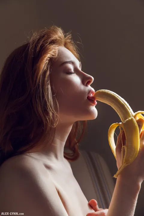 Jia Lissa: Pale Redhead Eats a Banana Then Fingers Her Pussy in Socks – photo 7 of 16