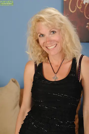 Mature Blonde Lifts Her Skirt and Spreads Her Pussy in Lingerie