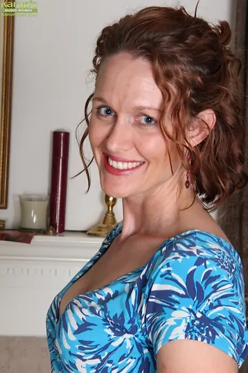 Tall Redhead MILF Undresses and Spreads Her Pussy