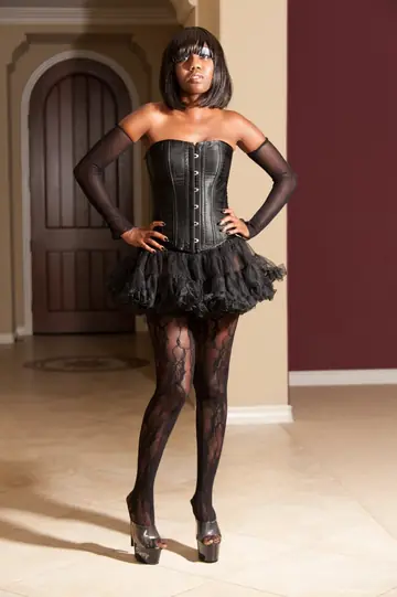 Slim Ebony MILF in Stockings Strips and Spreads Her Hairy Bush