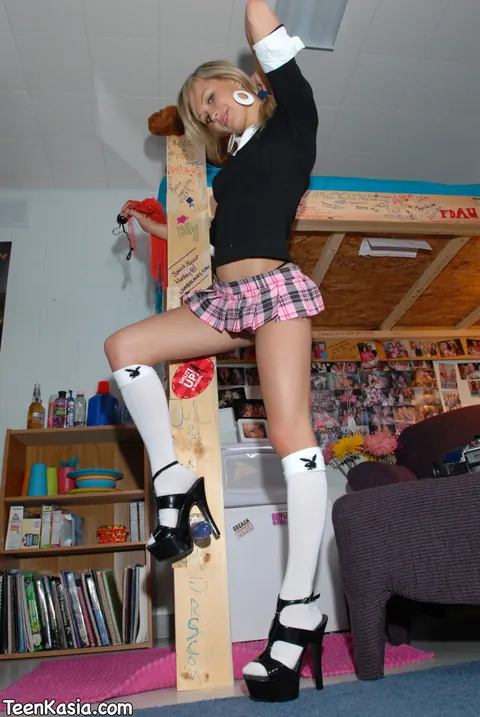 Blonde in Uniform Skirt Flashes Her Ass in Socks – photo 11 of 15
