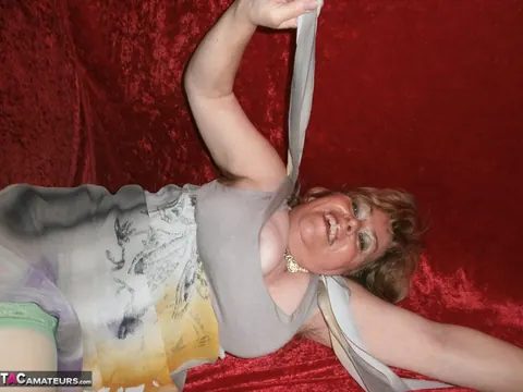 Mature BBW Flashes Cameltoe in Green Stockings and Heels – photo 16 of 20