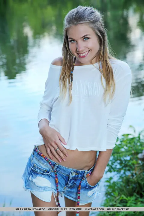 Lola Krit: Slim European Brunette Spreads Her Shaved Pussy by the Pond – photo 1 of 18