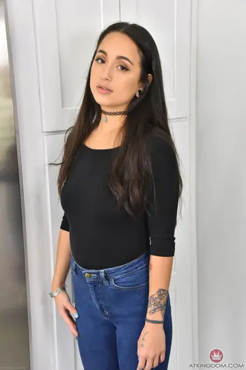 Tattooed Asian Brunette in Jeans Spreads Her Pussy