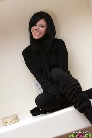 Brunette in Cosplay Stockings and Boots Strips and Poses