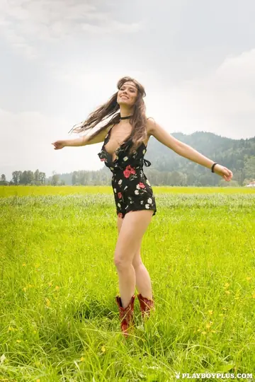Muirina Fae – Busty Brunette Strips Out of Her Boots Outdoors