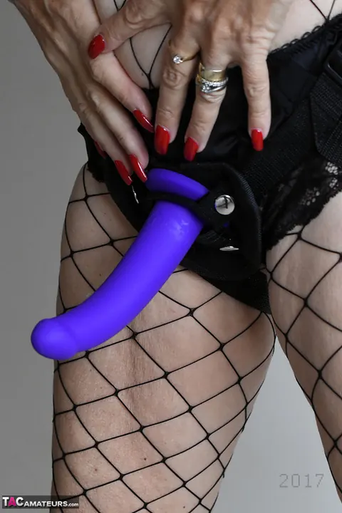 BBW with Big Tits in Fishnet Pantyhose Toys Herself – photo 15 of 20