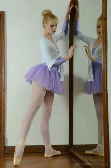 Ariel Anderssen – Tall British Blonde Undresses Out of Her Skirt and Pantyhose by the Mirror