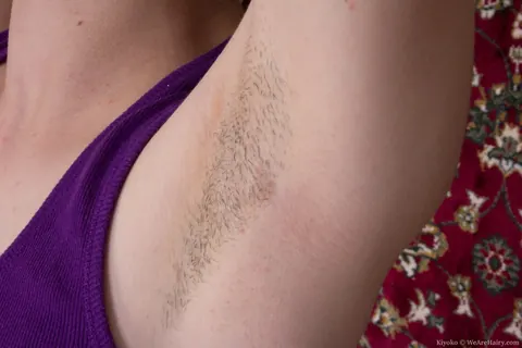 Brunette in Shorts Undresses and Spreads Her Hairy Bush – photo 4 of 16