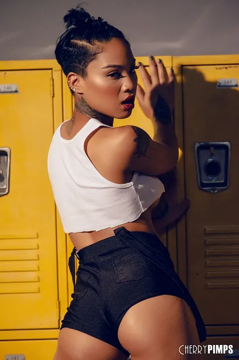 Honey Gold: Ebony Brunette with Short Hair Strips in the Locker Room – photo 4 of 21