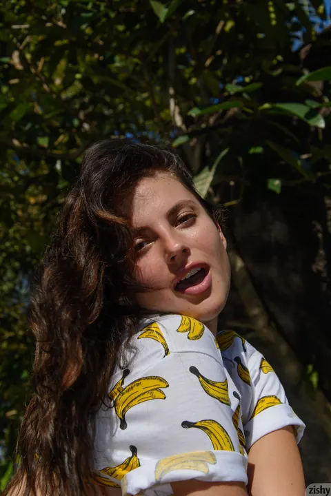 Jasmine Jazz: Ukrainian Brunette Strips Off Her Banana Top and Glasses Outdoors – photo 4 of 13