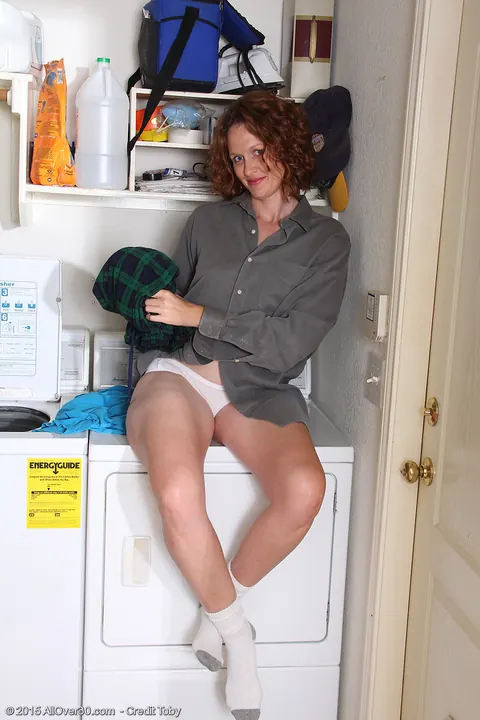 Roxanne Clemmens: Tall Mature Redhead in Panties and Socks Spreads Her Shaved Pussy – photo 3 of 15