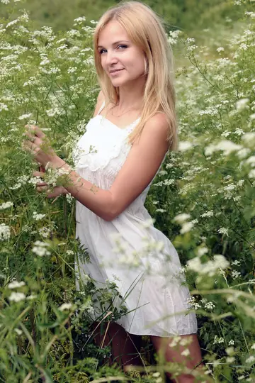Orvelia O – European Blonde Undresses and Poses Nude in the Forest
