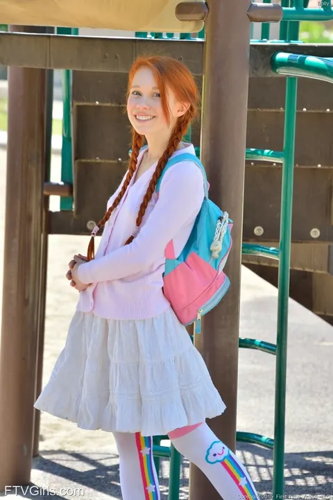 Skinny Redhead in Uniform Toys Her Pussy Outdoors – photo 1 of 15