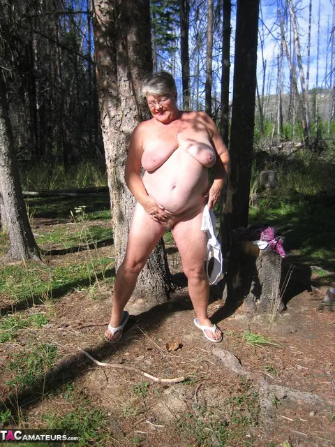 BBW in Glasses Strips Nude in the Forest – photo 18 of 20