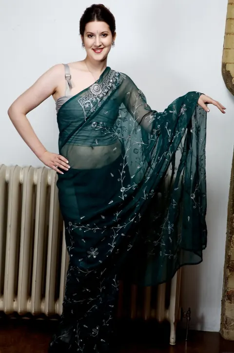 Indian Brunette Reveals Her Tits While Undressing from a Skirt – photo 10 of 15