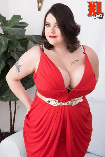 Tattooed Brunette BBW MILF Peels Off Her Red Dress for Lingerie