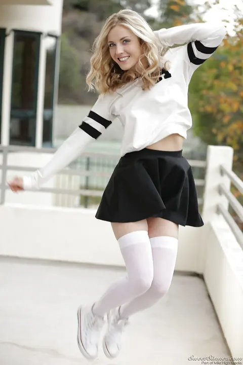 Karla Kush: Blonde in Uniform and Stockings Poses Topless Outdoors – photo 5 of 16