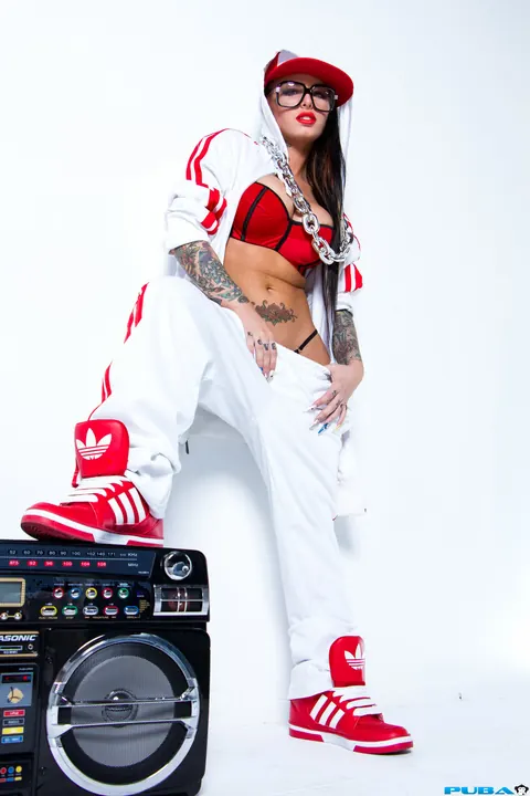 Christy Mack: Busty Brunette in Glasses Poses in Extravagant Outfit – photo 12 of 18