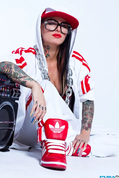 Christy Mack: Busty Brunette in Glasses Poses in Extravagant Outfit – photo 9 of 18