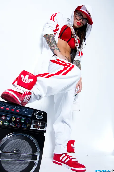 Christy Mack: Busty Brunette in Glasses Poses in Extravagant Outfit – photo 13 of 18