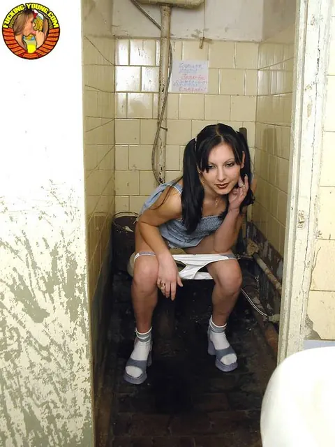 Pigtailed Woman Squats to Pee on Toilet in Socks – photo 6 of 20