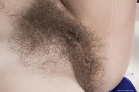 Pixxy: Busty Brunette Spreads Her Hairy Pussy in the Bathroom – photo 11 of 16