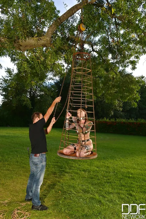 Lauren Brock: Tattooed Blonde PAWG Poses in Outdoor Fetish Bondage – photo 12 of 16