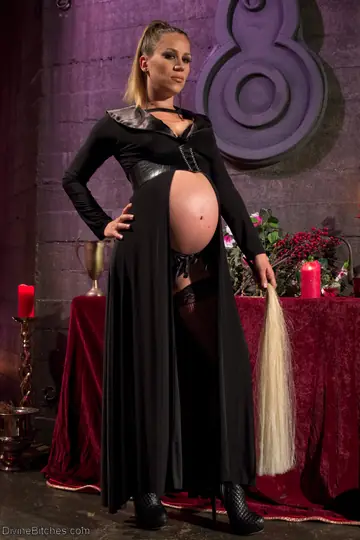Pregnant Blonde Models Lingerie with Restraints for BDSM
