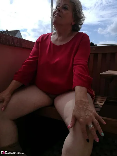 Short-Haired Woman Pulls Down Her Pantyhose and Spreads Her Pussy on the Patio – photo 13 of 20