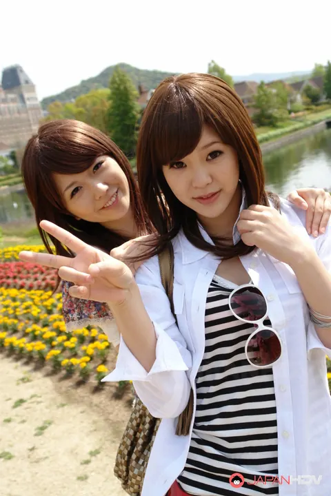 Asian Lesbians Kiss and Make Out Outdoors in Skirts and Heels – photo 1 of 15