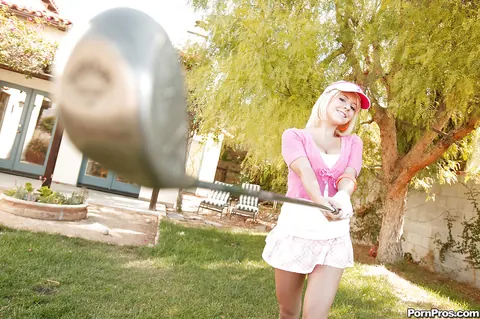 Tessa Taylor: Busty Blonde Flashes Her Panties in a Skirt on a Golf Course – photo 16 of 16