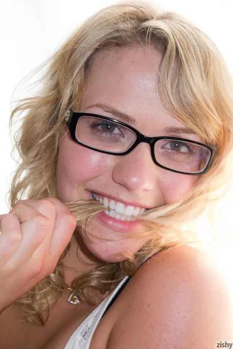 Mia Malkova: Busty Blonde in Glasses Poses in Denim Shorts on a Motorcycle – photo 4 of 11