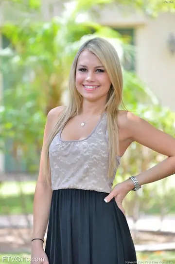 Busty Blonde in a Black Lace Thong and Heels Flashes Outdoors