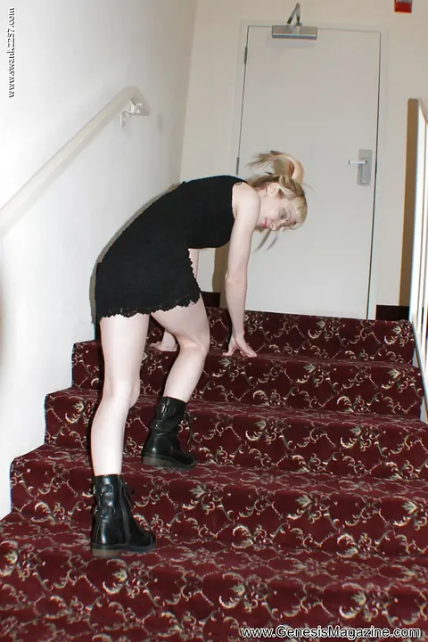 Tattooed Blonde Babe Poses in a Black Dress and Boots – photo 11 of 16