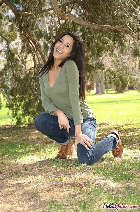 Bella Quinn: Thick Latina Brunette Climbs a Tree in Jeans and Sweater Outdoors – photo 5 of 12