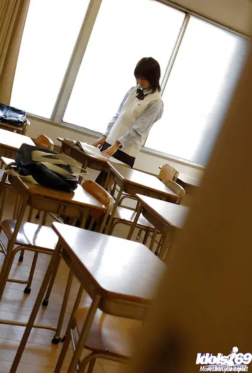 Japanese Woman in Uniform Lifts Her Skirt and Flashes Panties